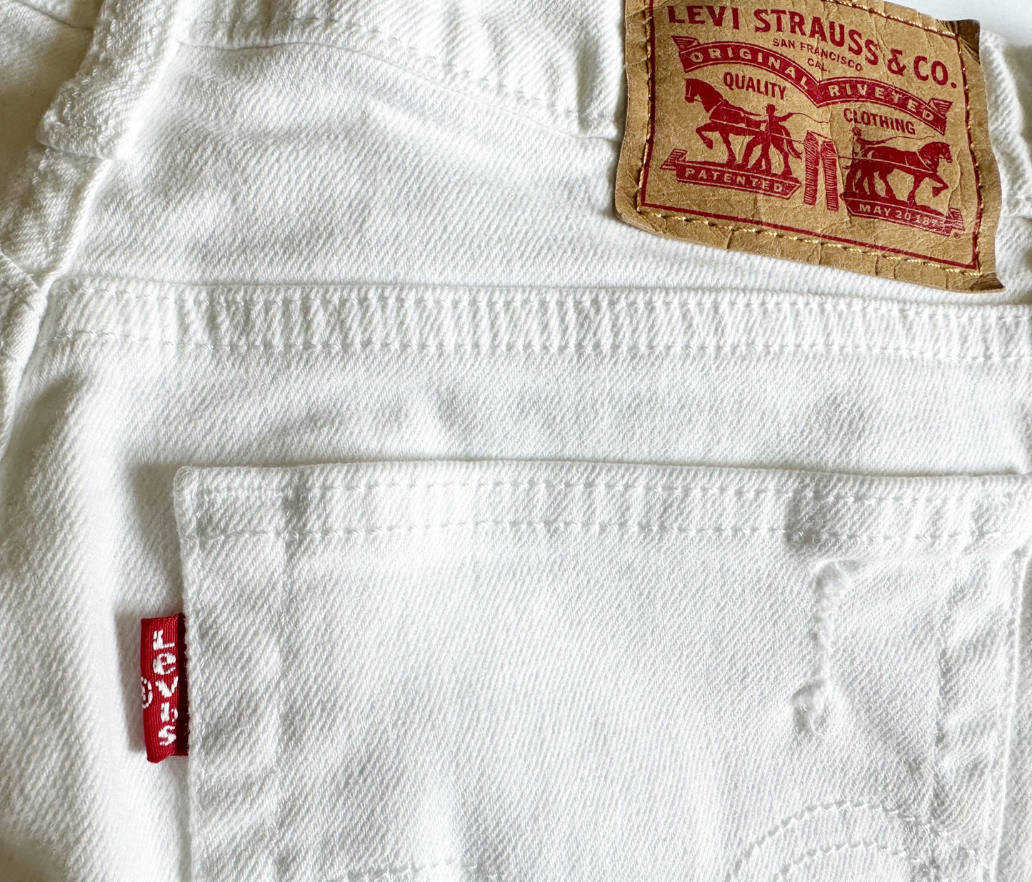 Levi's White High Rise Cut Off Shorts